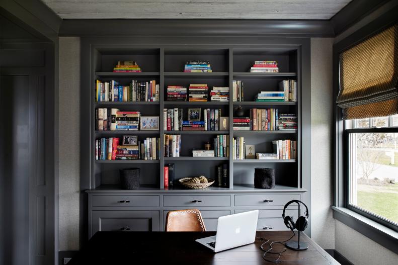 contemporary home office with brown leather chair