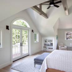 Contemporary White Master Bedroom With Vaulted Ceiling And Exposed Beams