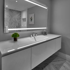 Modern Guest Bathroom With Gray And White Vanity And Contemporary Floor And Wall Tile