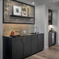 Modern Bar With Upholstered Accent Wall And Metallic Glass Backsplash
