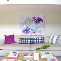 Purple Art, Pillows Help Tie Contemporary Living Room Together