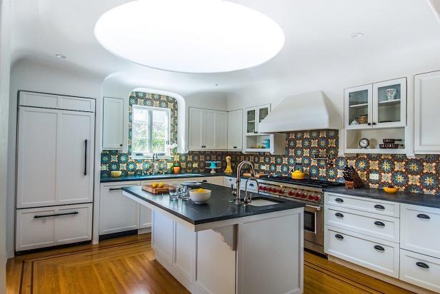 Contemporary White Kitchen With Spanish Tile Backsplash And Skylight Hgtv