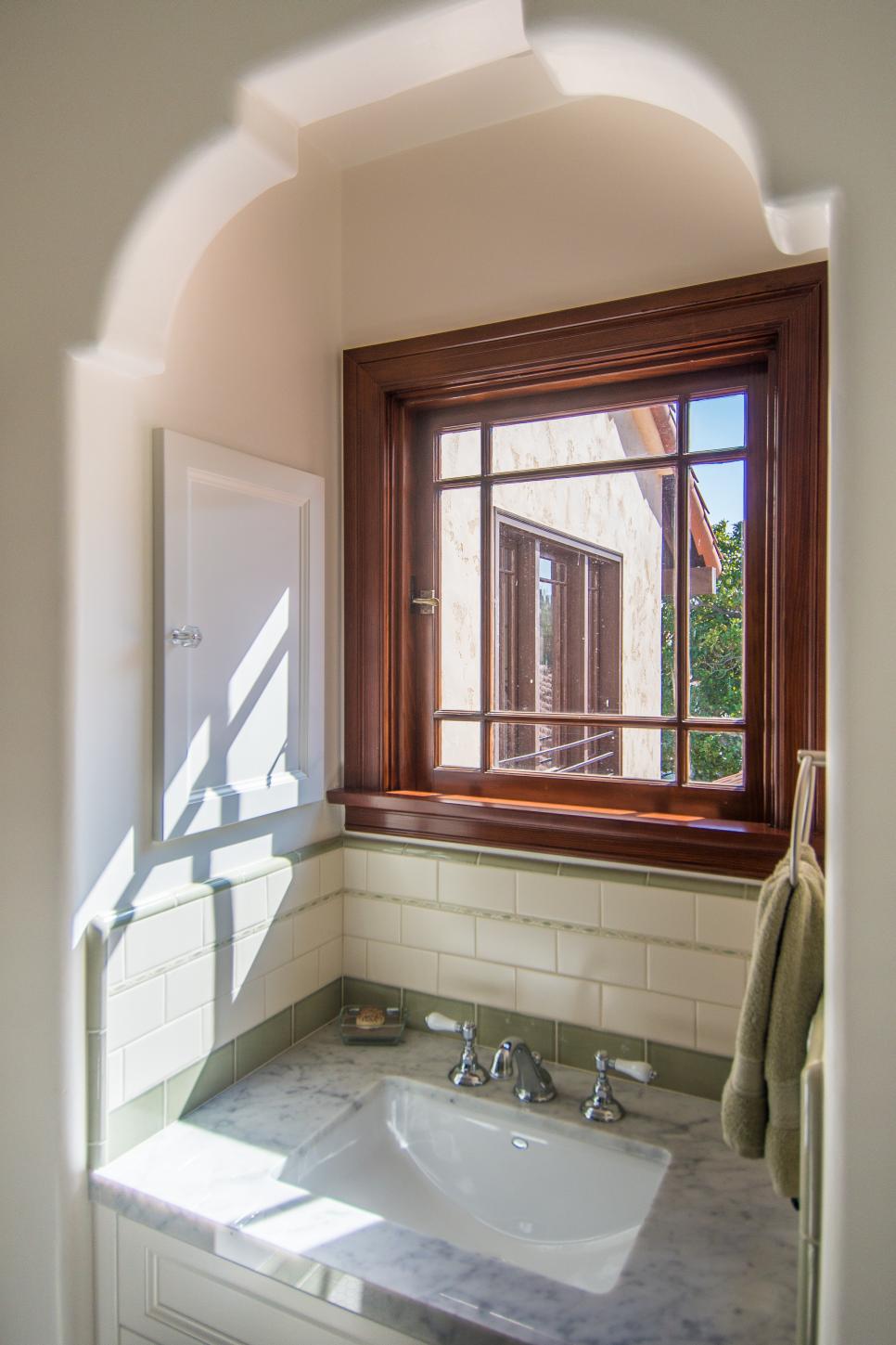 Traditional White Bath With Marble Topped Sink And Spanish