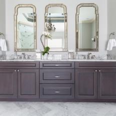 Contemporary White Master Bathroom With Double Marble Topped Vanity And Mirror Accents