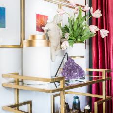 Eclectic Living Room Detail With Modern Gold Side Table And Art
