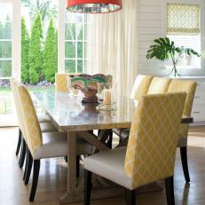 Cottage Dining Room With Red Pendant