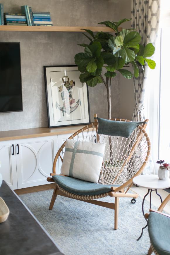 Living Room Detail With Rope Chair And Built In Cabinet And Book Shelf