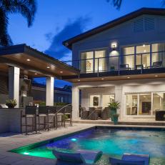Pool, Patio and Outdoor Kitchen at Night