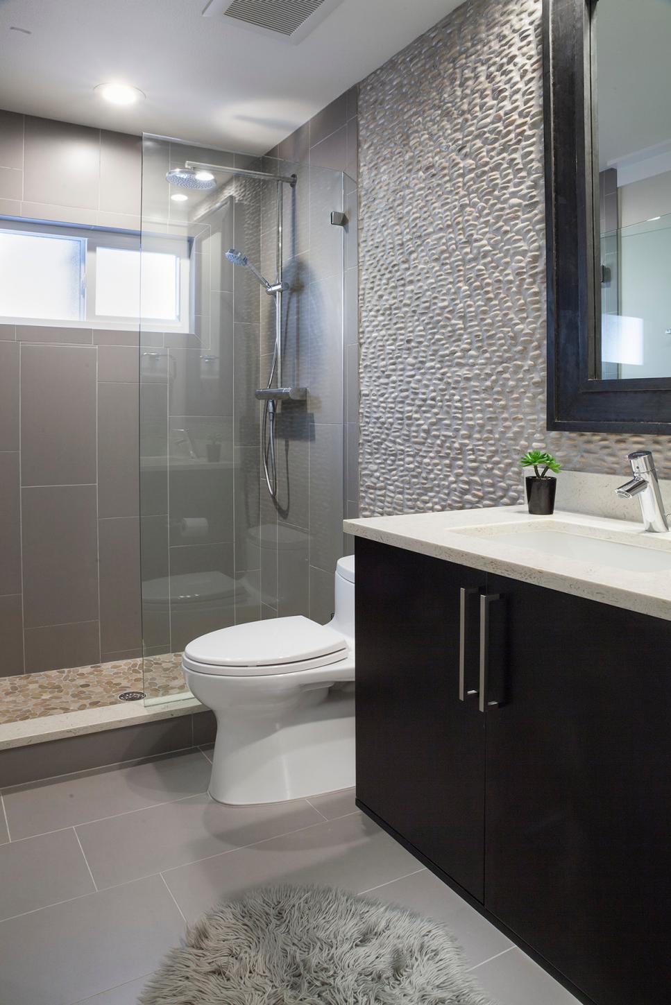 Gray Modern Bathroom With Stone Wall | HGTV