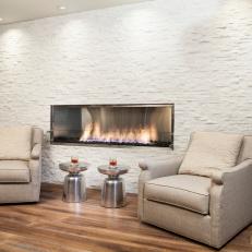 White Sitting Area With Stone Accent Wall