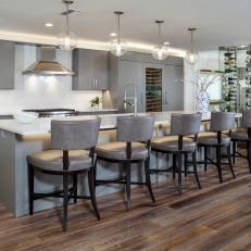 Gray Open Plan Kitchen With Leather Barstools
