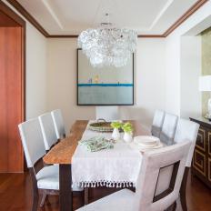 Neutral Dining Room With White Chairs