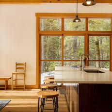 Neutral Open Plan Kitchen With Forest View