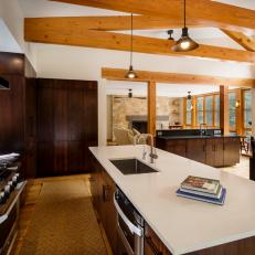 Open Plan Neutral Kitchen With Exposed Beams
