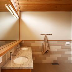 Neutral Asian Bathroom With Brown Tiles
