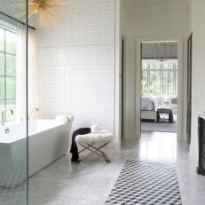 Traditional White Master Bathroom With White Subway Tile And Modern Accessories