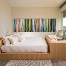 Modern Bedroom With Striped Art