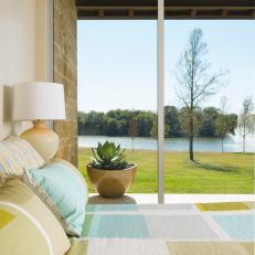 Contemporary Bedroom With Lawn and Lake View