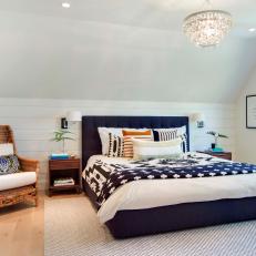 Contemporary White Bedroom With Blue Bed