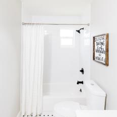 Black and White Small Bathroom With Mosaic Floor