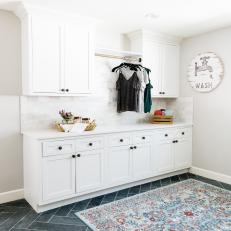 Cottage Laundry Room With Hanging Rod