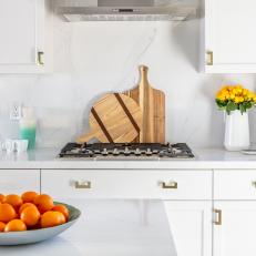 White Kitchen With Wood Cutting Boards