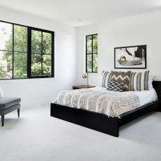 Modern White Master Bedroom With Black And Neutral Accents