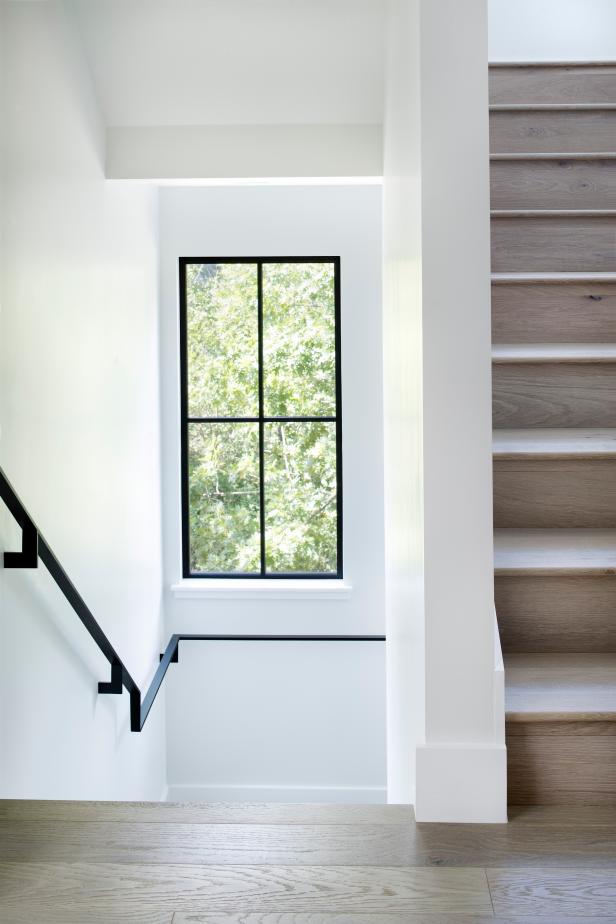 Modern Farmhouse Stair Hallway Detail With Hardwood Floors