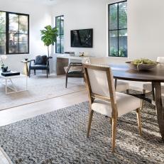 Modern White Farmhouse Living And Dining Room With Midcentury Modern Accents