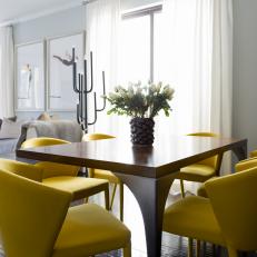 Modern Apartment Open Concept Living And Dining Room With Yellow Upholstered Dining CHairs