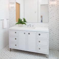 White Bathroom With Striped Tile Wall