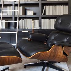 Contemporary Black Leather Recliner and Ottoman