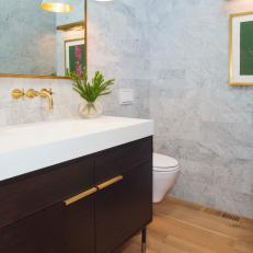 Gray Marble Bathroom With Wood Floor