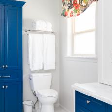 Blue and White Bathroom With Dragon Valance