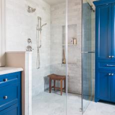 Blue and White Master Bathroom With Glass Shower