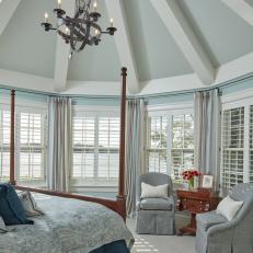 Traditional Blue Master Bedroom With Rounded Walls