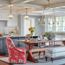 Neutral Transitional Open Plan Kitchen With Red Chairs