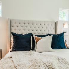 Modern White Master Bedroom With Neutral Tufted Upholstered Headboard