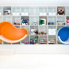 Bookcase With Colorful Reading Pods Keeps Playroom Organized