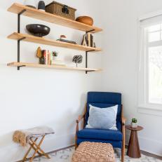 Midcentury Neutral Sitting Area With Blue Chair
