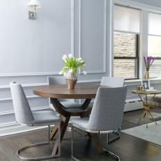Blue-Gray Dining Room With Round Table