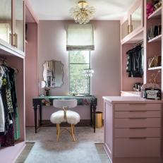 Pink Walk-In Closet With Dressing Table