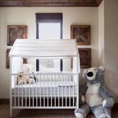 Nursery With Crib and Bear
