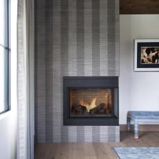 Gray Striped Fireplace in Master Bedroom