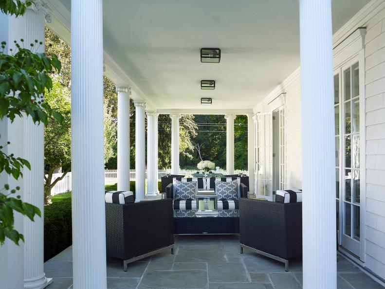 Country Colonial Columned Porch With Contemporary Seating Area