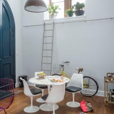 Eclectic Dining Area With Yellow Bike