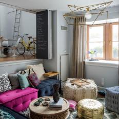 Eclectic Living Room With Pink Sofa