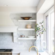 Contemporary Kitchen With White Marble Tile Backsplash And Countertops And Modern Bronze Faucet