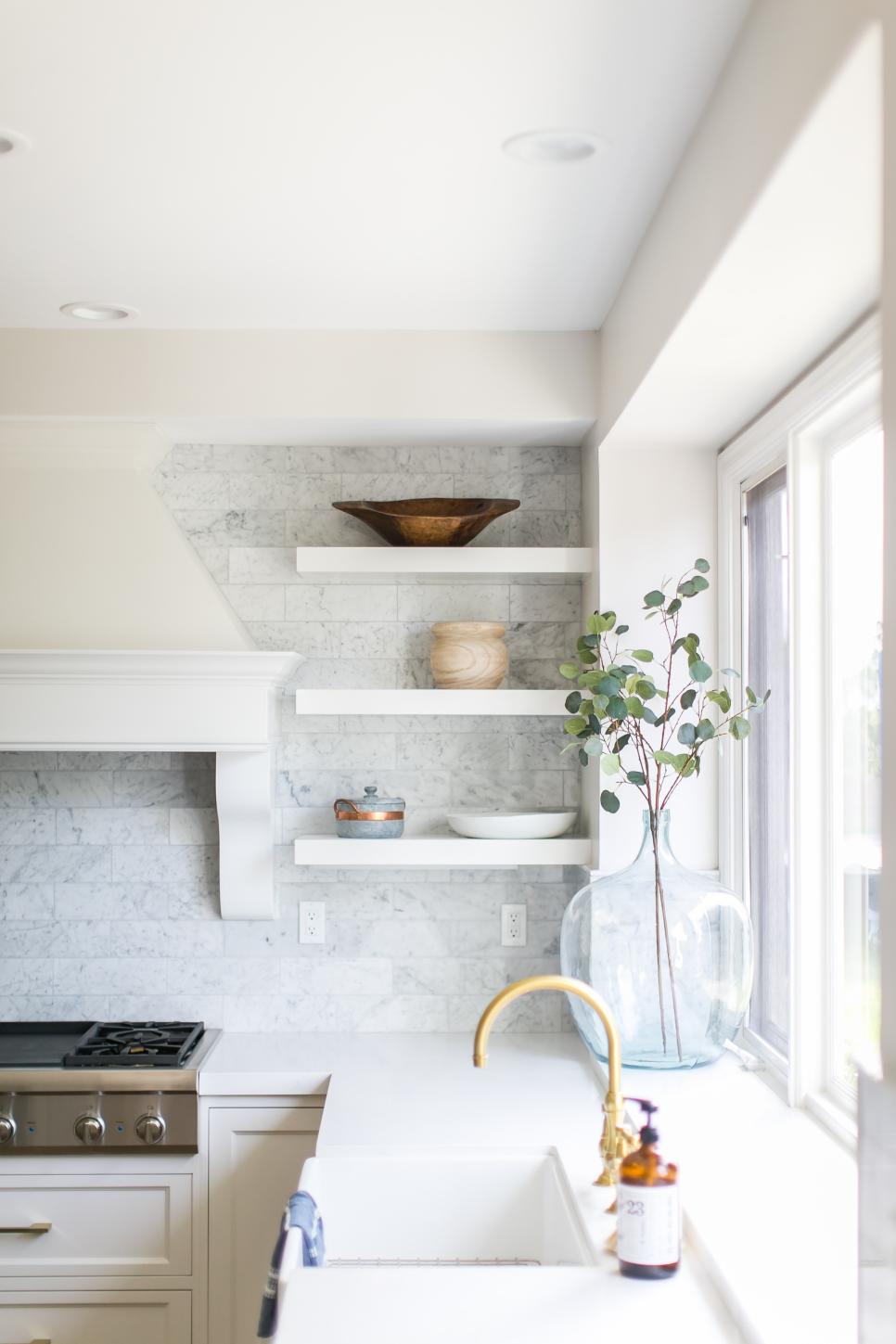 Contemporary Kitchen With White Marble Tile Backsplash And Countertops
