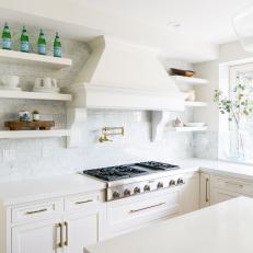 Contemporary Kitchen With White Marble Tile Backsplash And Vent Hood